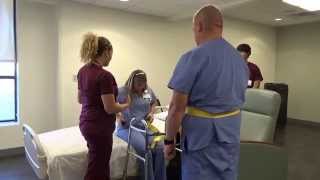 Physical Therapy Transfer Training  How To Transfer From Wheelchair To Bed [upl. by Aronoff]